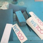 We100 logo used by Trinity Set & Stage to create their bench